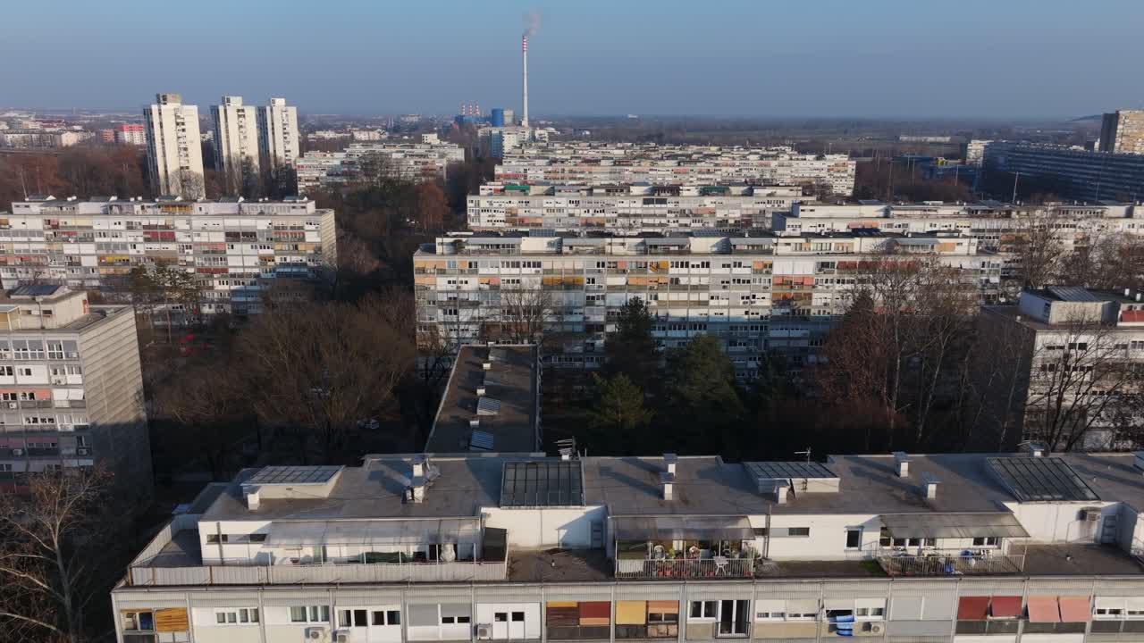 Daytime aerial of Zagreb’s residential neighborhoods, with numerous mid rise apartment buildings stretching toward the horizon