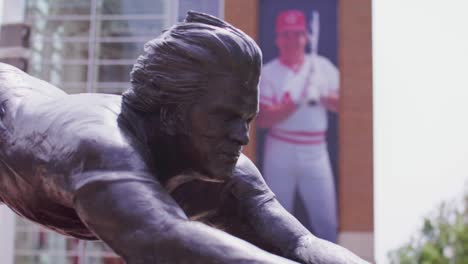 cincinnati reds pete rose statue pulls focus from the statue to a photo of him on the building