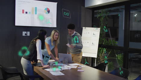 in office, diverse team collaborating on sales data with animation overlay