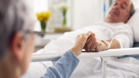 hospital, bedroom and senior couple holding hands