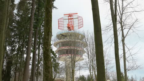 Radar-Tower-At-Neunkirchner-Höhe,-Darmstadt,-Odenwald-With-Forest-In-Front-During-Winter