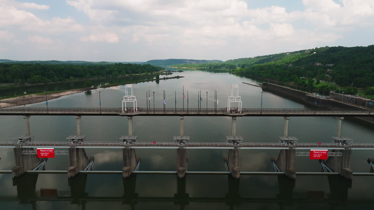Fly Over Big Dam Bridge Gates Over Arkansas River In Cook's Landing Park, North Little Rock, Arkansas USA