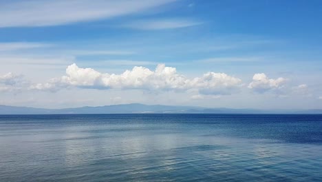 hyperlapse of calm sea and fast clouds in halkidiki, greece