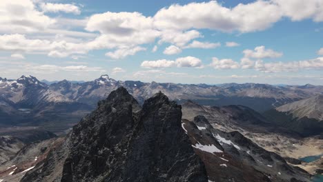 two mountaineers on the top of a mountain in patagonia