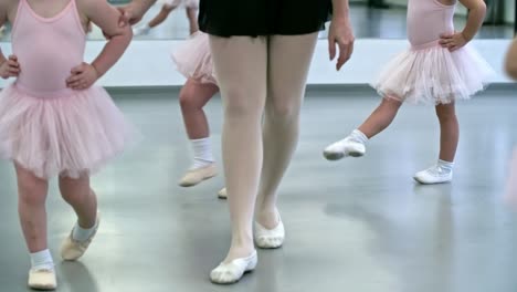 girls having ballet lesson