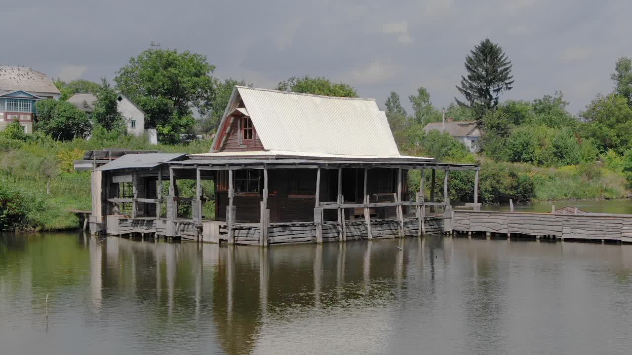Old Wooden House on a Lake