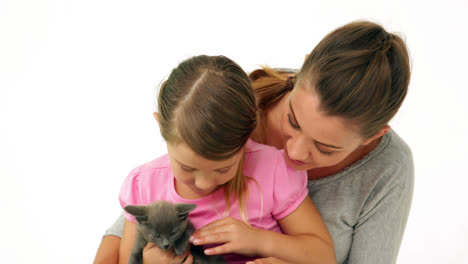 Cute-mother-and-daughter-with-a-little-grey-kitten