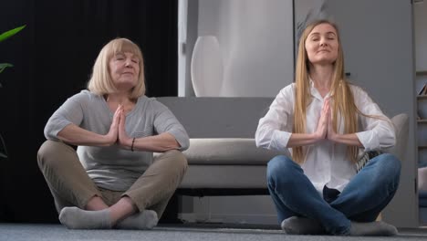 women doing yoga together