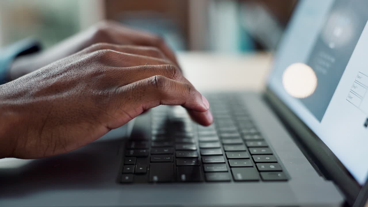 Hands typing, laptop keyboard and closeup at desk