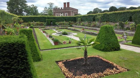 the beauty of the gardens outside hampton court palace, london, united kingdom