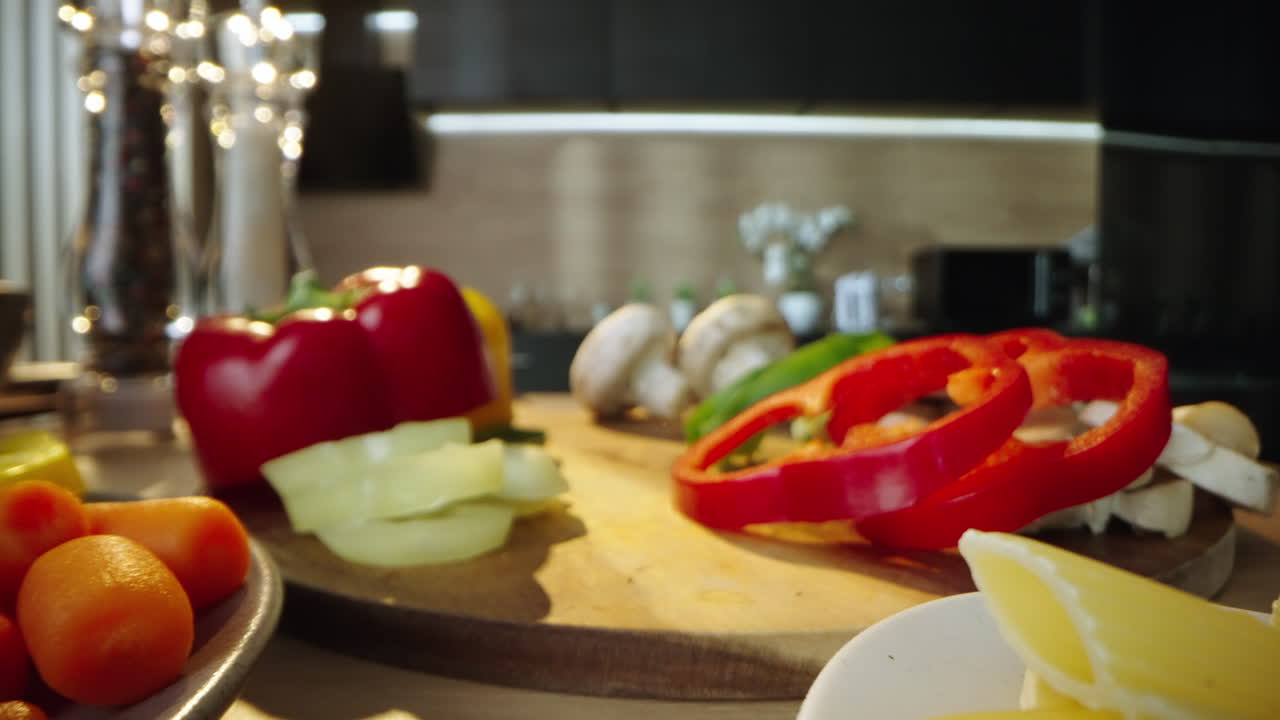 Peppers, Mushrooms, and Other Ingredients on a Cutting Board