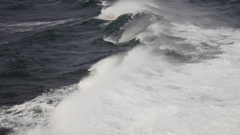 violent crushing waves in the stormy open sea