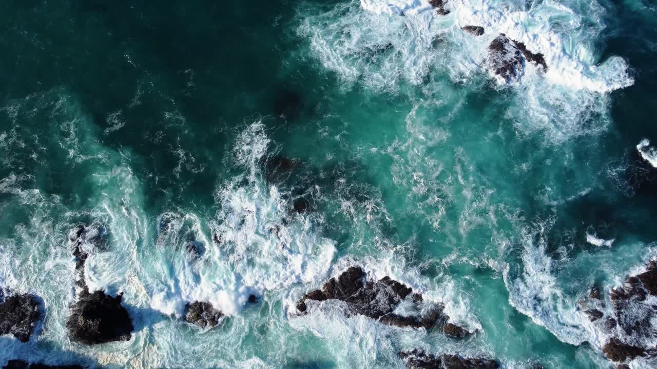 AERIAL View of Waves Crashing on a Rocky Coast in Bay of Islands, New Zealand