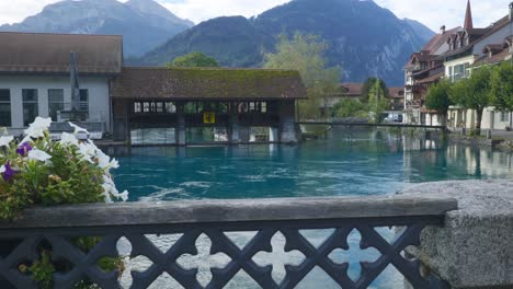 Interlaken-Immersive-POV:-Moving-Through-Early-Morning-City-Streets-In-Switzerland,-Europe,-Walking-|-Iconic-Muhleschleuse-Mill-Landmark