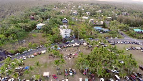 Festival-gathering-at-the-cliff-on-Seaview-lawn-around-sunset,-Hawaii-Island