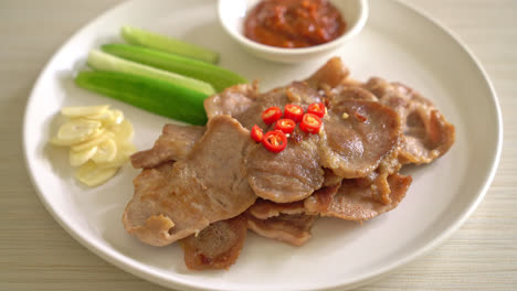 grilled-pork-neck-sliced-on-plate-in-Asian-style