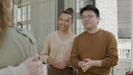 a young  couple receives a gift from friends