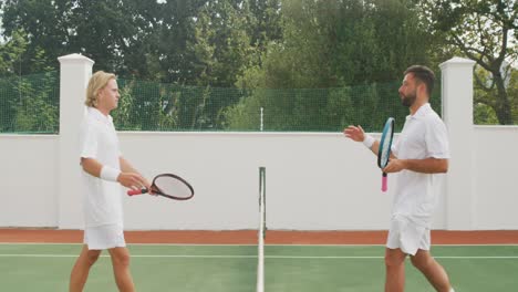 tennis players shaking hands