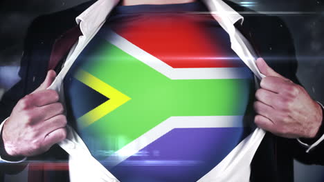 Businessman-opening-shirt-to-reveal-south-african-flag-