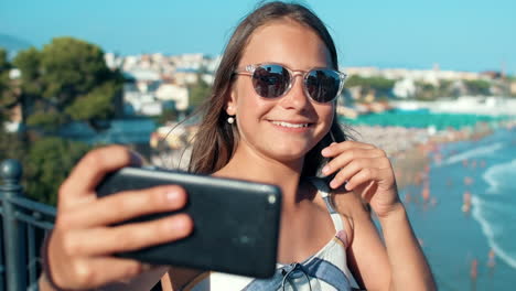 Joyful-girl-enjoying-summer-holiday-outdoor.-Teenager-posing-for-camera-outside.