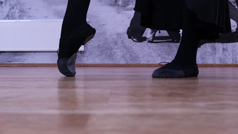 female dancer stretching before dancing