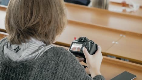 student taking photo in classroom