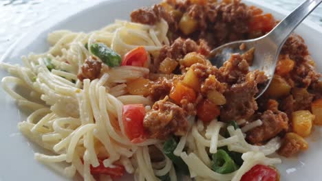 Ground-beef-stew-with-potato-cubes,-Couscous-and-noodles-with-green-vegetables-and-red-bell-peppers-in-mayonnaise-light-meal-dinner