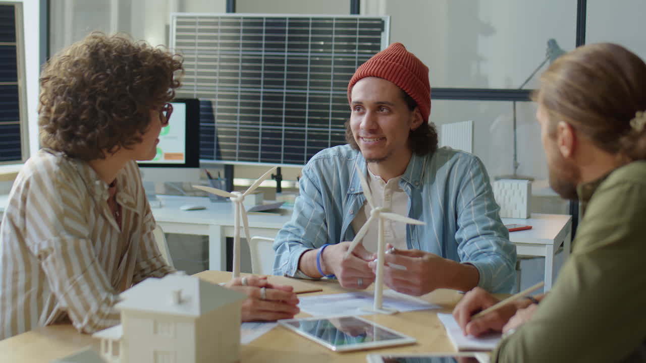 Team of Green Energy Engineers Discussing Project
