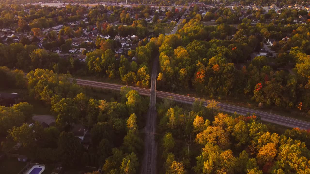 Sunrise Over Forested Shoreline in Ontario During Fall