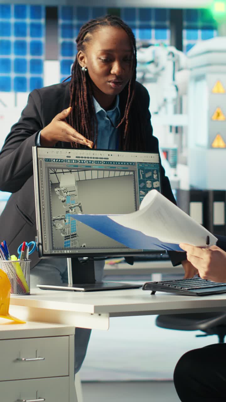 Vertical Video Solar Panels Plant Coworkers Doing Computer Simulations In Cad Program