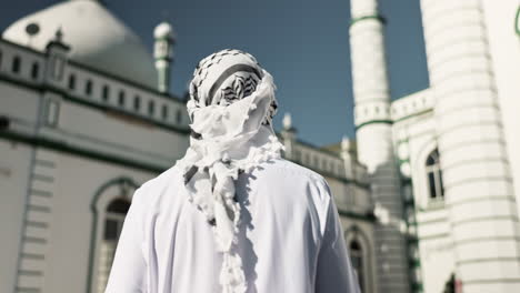 man in keffiyeh at mosque