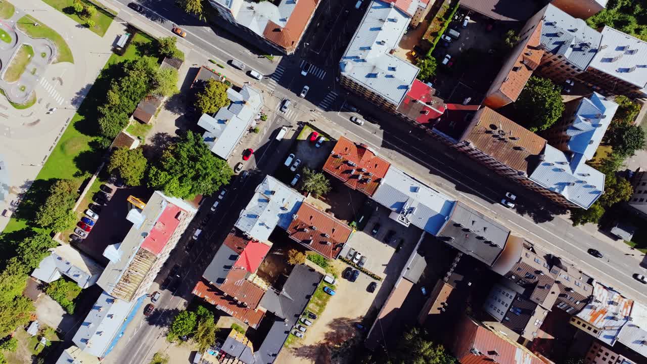 Top down of Čaka street Grīziņkalns rooftops trees near Ziedoņdārzs park, Riga
