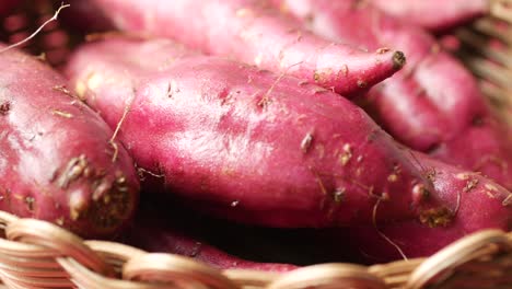 purple sweet potatoes in a basket