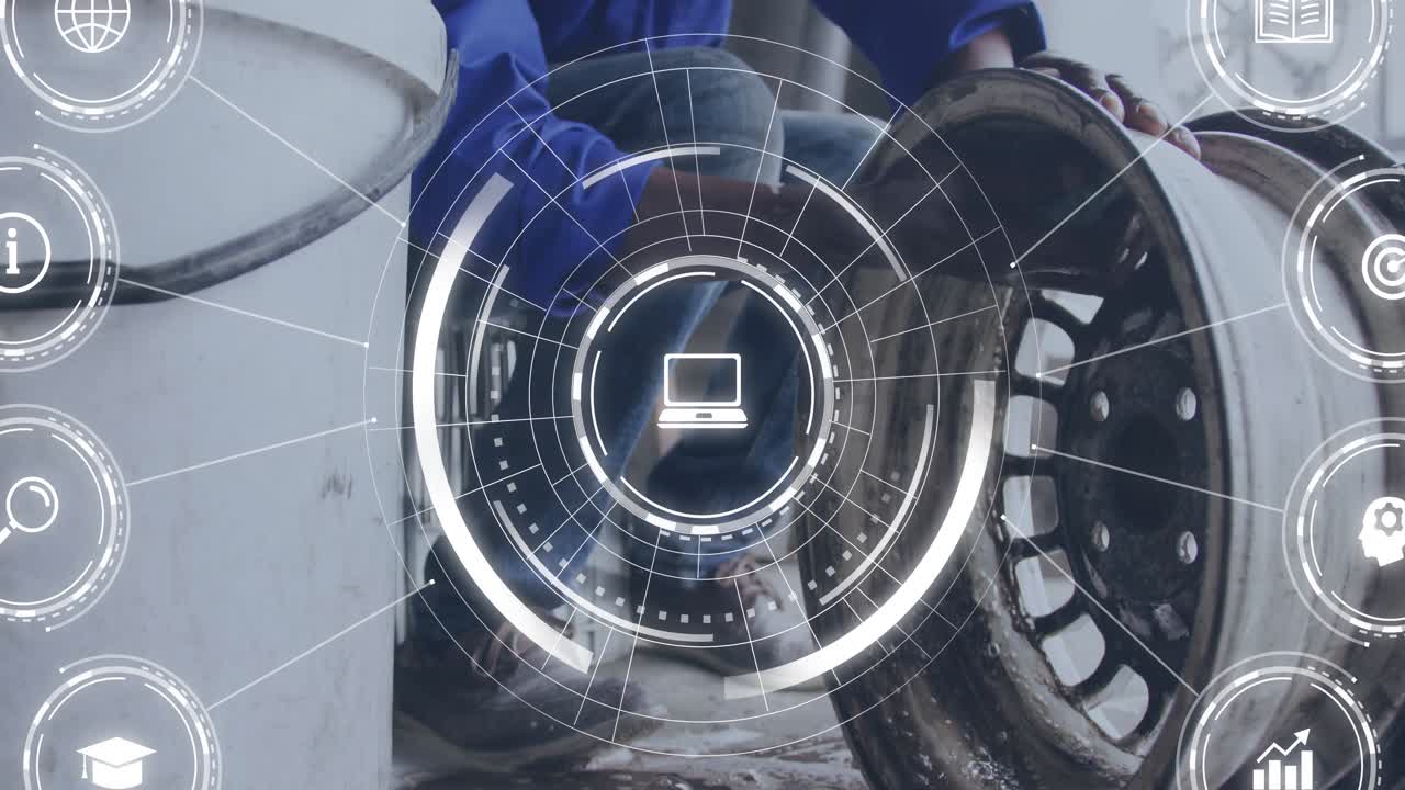 カメラが引くと、自動車整備士が膝をついてリムを回転させている姿が現れ、HUDが検査を案内している。
