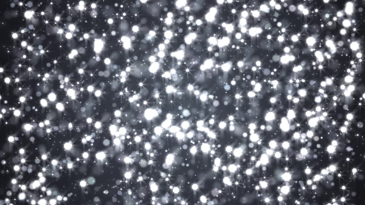 Partículas de estrellas abstractas parpadeantes sobre fondo gris