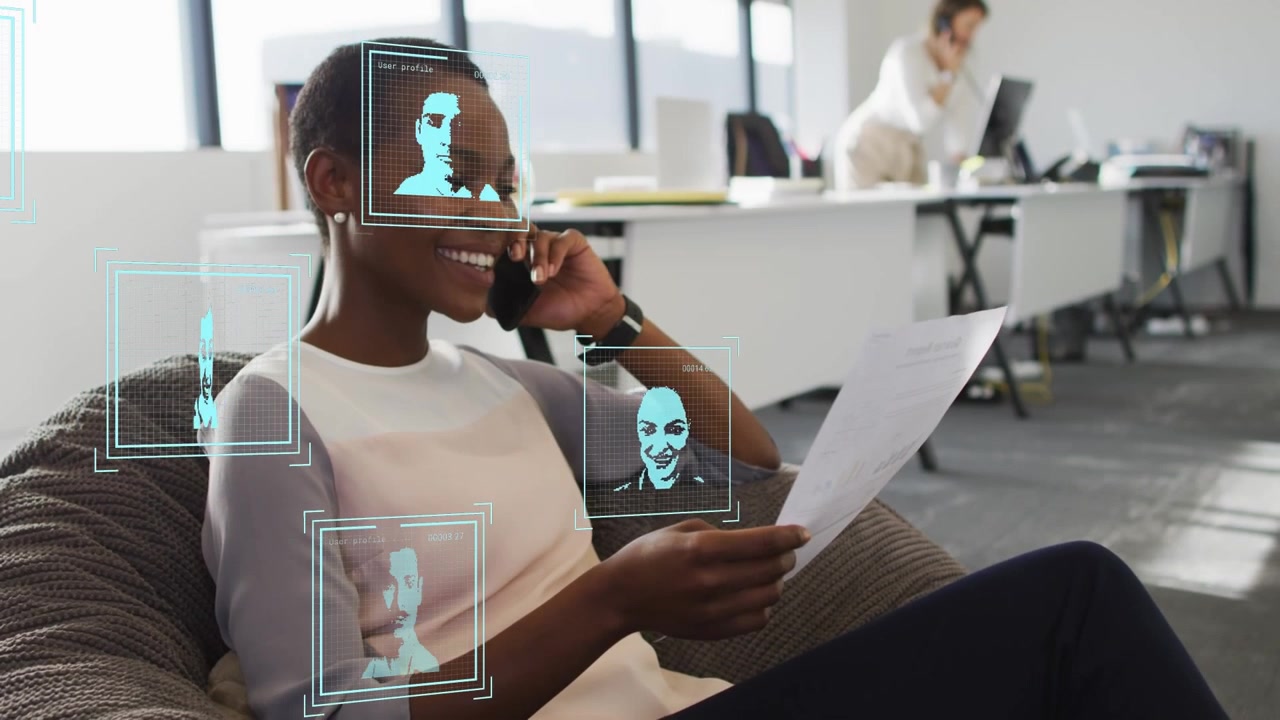 Animation of people icons over diverse business people