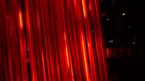 Red-lights-are-moving-upward-into-the-tubes