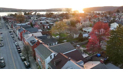 spectacular drone footage of a waterfront community at sunset in small town america