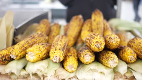 grilled corn for sale in a market stall in istanbul