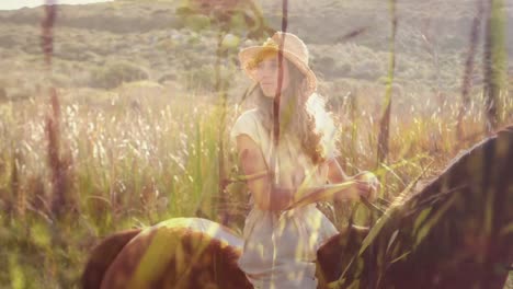 composite video of tall grass against caucasian woman sitting on her horse