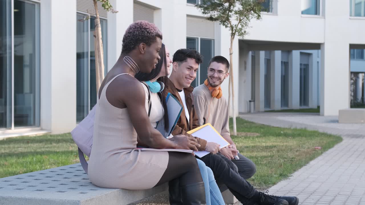 Multiethnic group of friends chatting in the campus