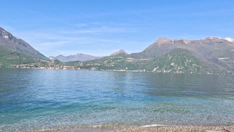 calm waters and mountains in lombardy, italy