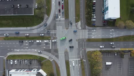 peaceful iceland road intersection with traffic crossing streets, top down