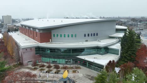 drone shot pulling away from the spokane arena in washington state