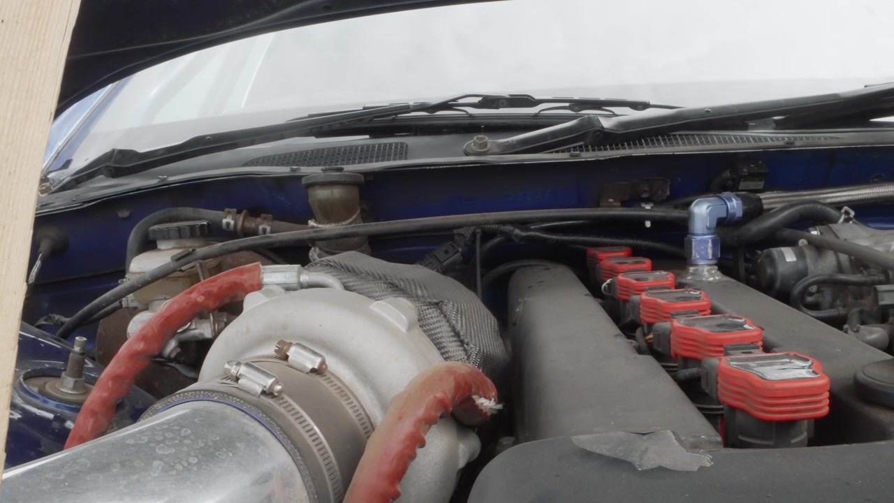 Close-up of a Modified Car Engine with Turbocharger
