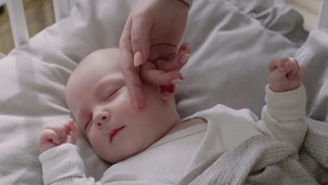 Top-view-of--newborn-sleeping-in-the-crib