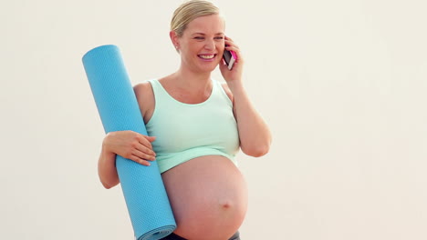 pregnant blonde talking on the phone