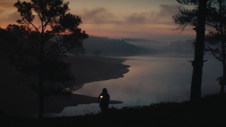 Sunrise Hike by a Misty Lake