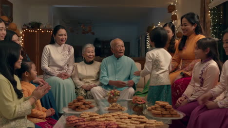 a multi-generational asian family celebrates together