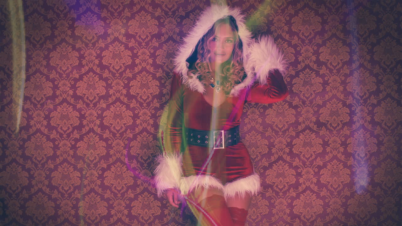 Santa Claus and Woman in xmas costume for christmas time disco shoot